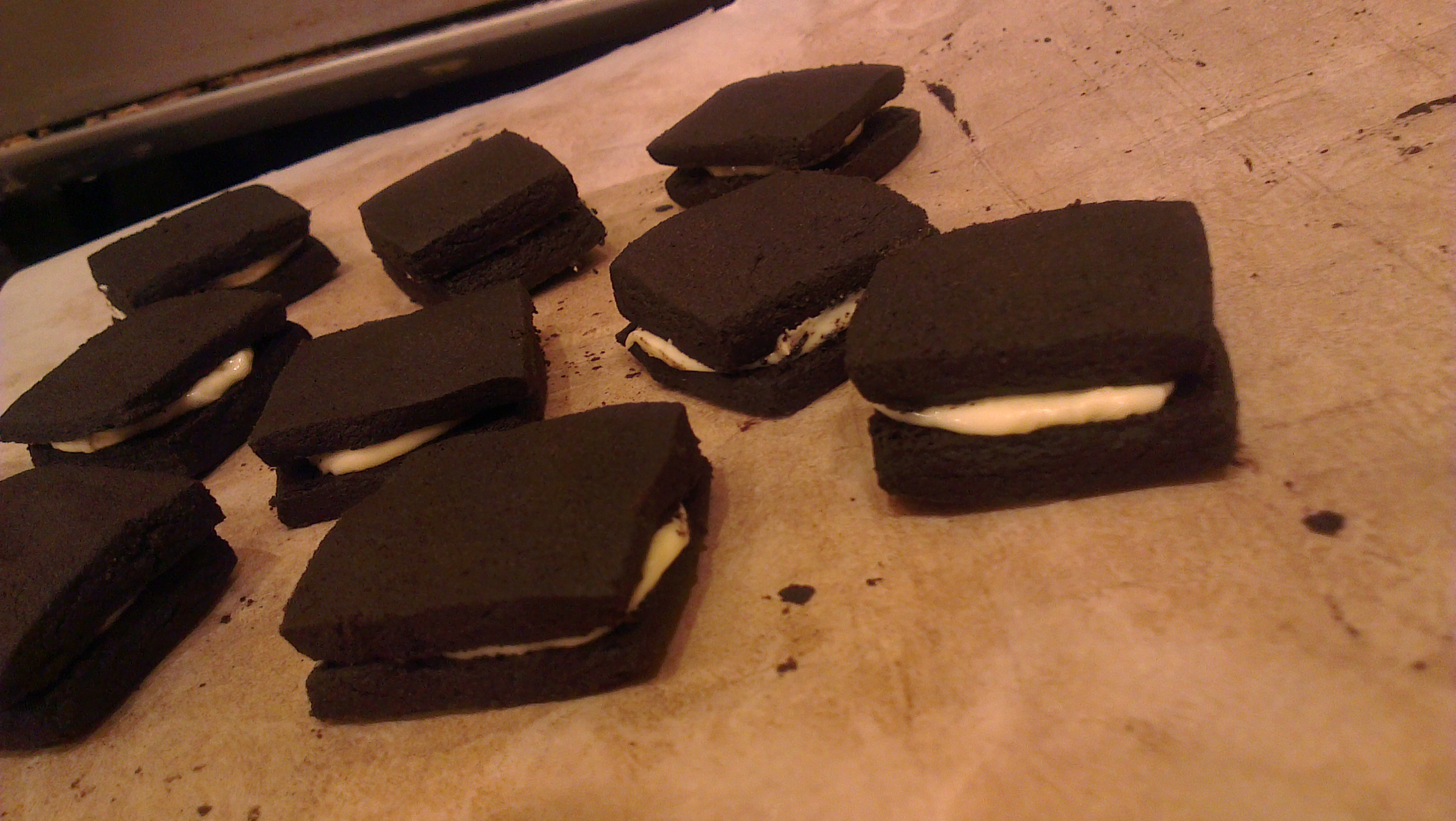 Chocolate cookies stuffed with white chocolate ganache